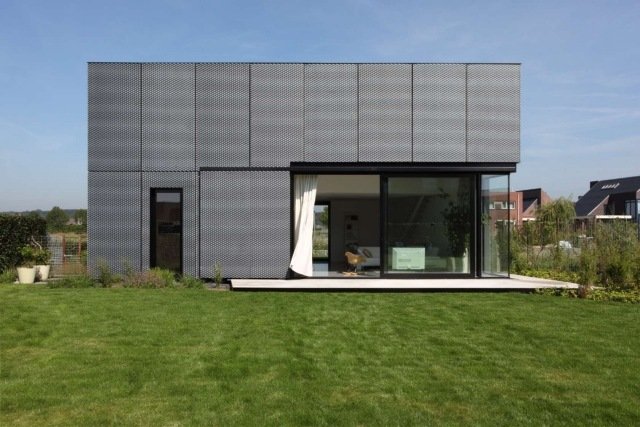 bostadshus-minimalistisk-metall-front-platt-effekt-panel fasadelement