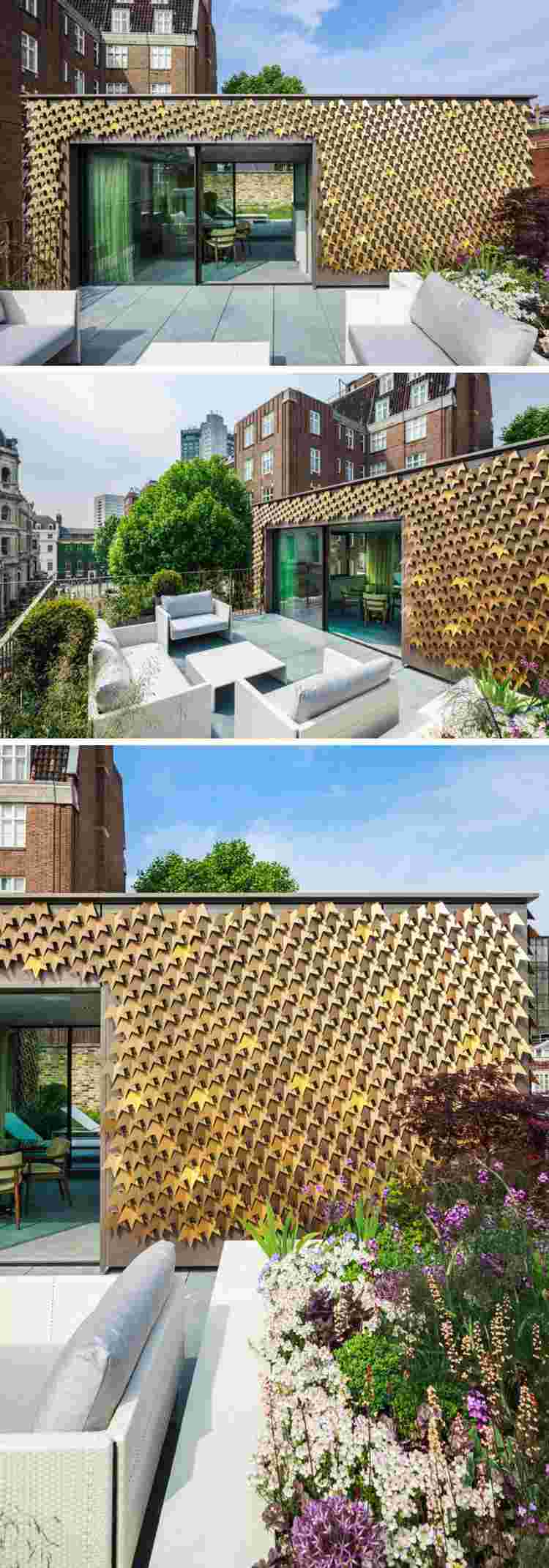 Fasadbeklädnad av takterrass i metall med murgröna blad