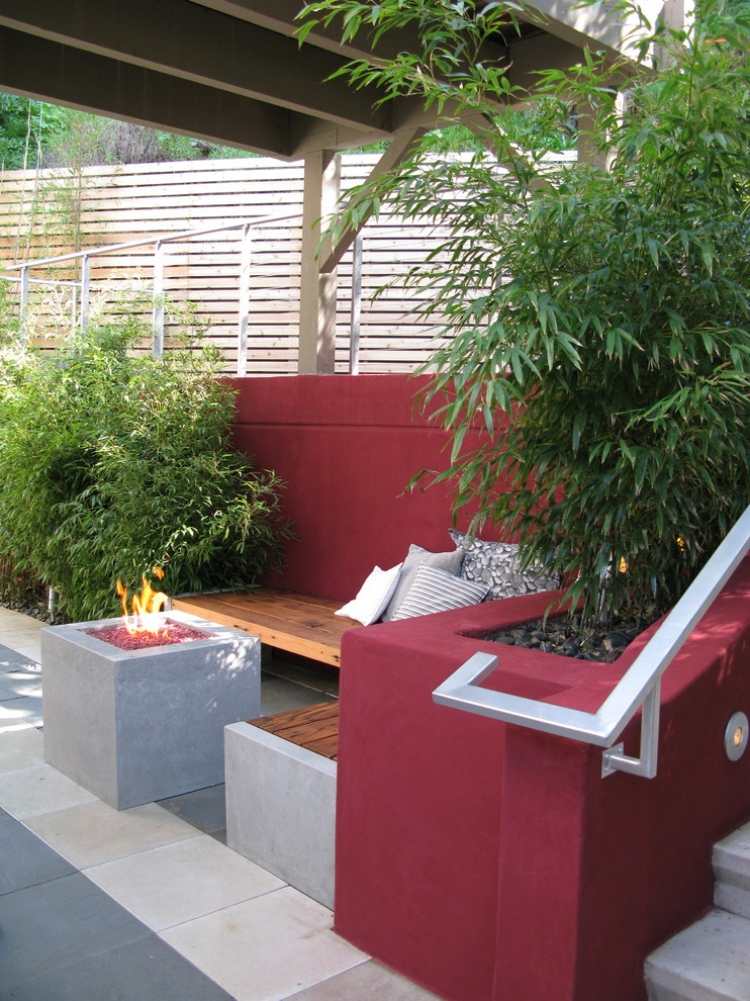 feng-shui-trädgård-design-rödmålad-vägg-bambu-öppen spis