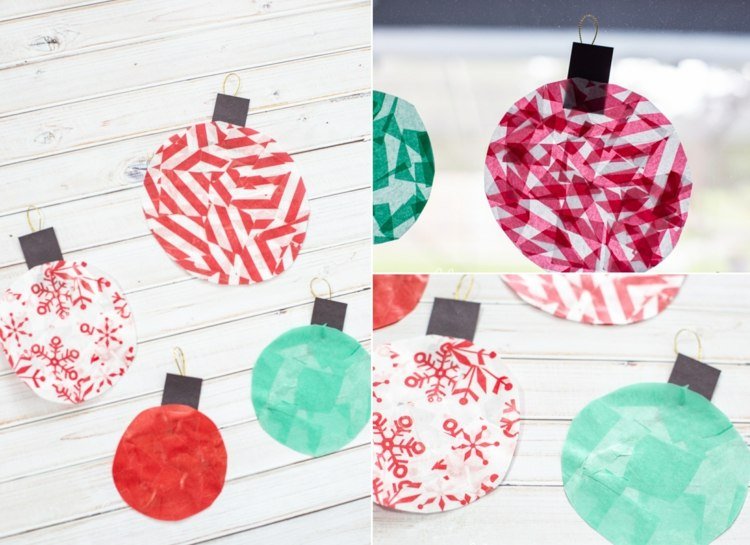 Dekorera fönstret till jul med julkulor av transparent papper