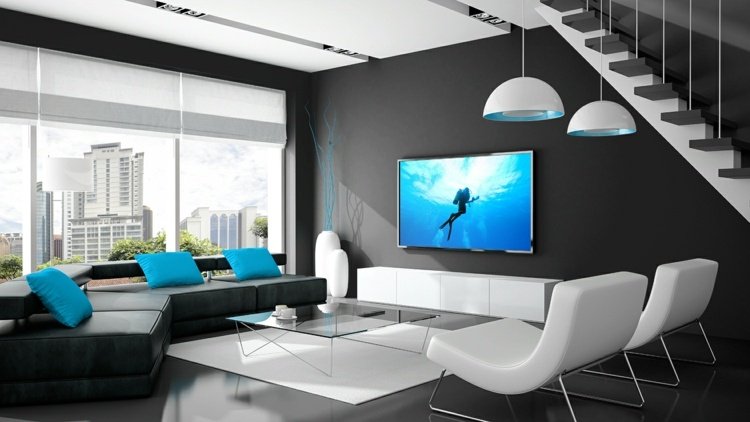 tv-på-väggen-svart-vitt-vardagsrum-blå-accenter
