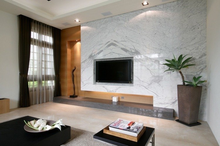 tv-vägg-idéer-ädel-marmor-vit-lowboard-sten-grå-planter
