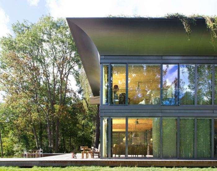 prefab hus design två våningar fönster trädgård
