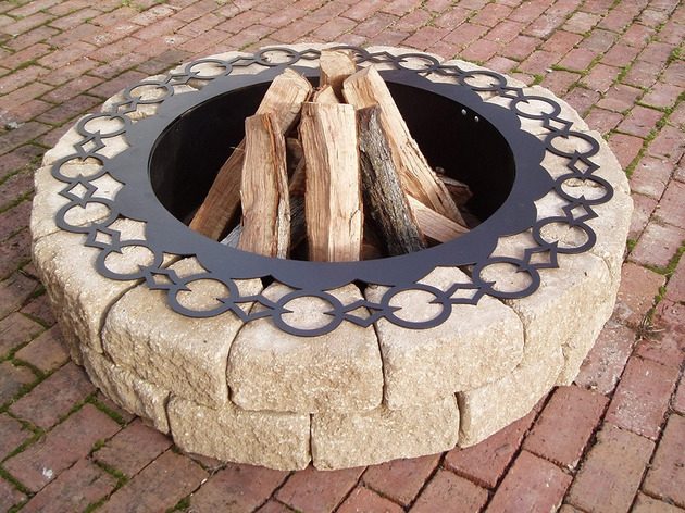 Firepit-made-of-metal-stone-edge-edge-open-garden-equipment