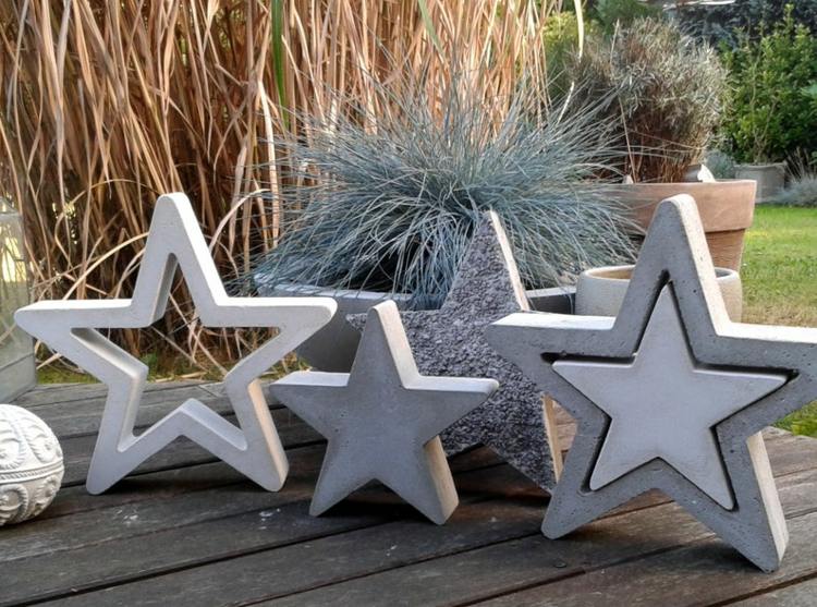 Gör dina egna stjärnor som figurer av betong för att designa trädgården