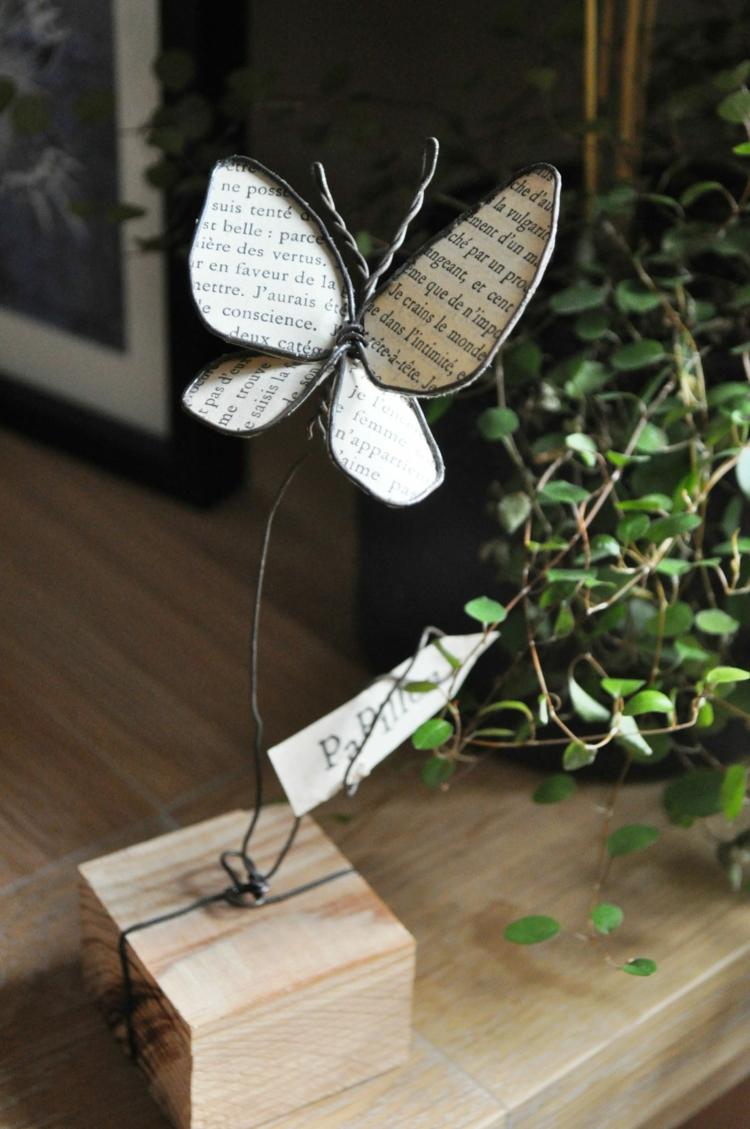 Gör en fjäril - en idé med papperstråd och tidning