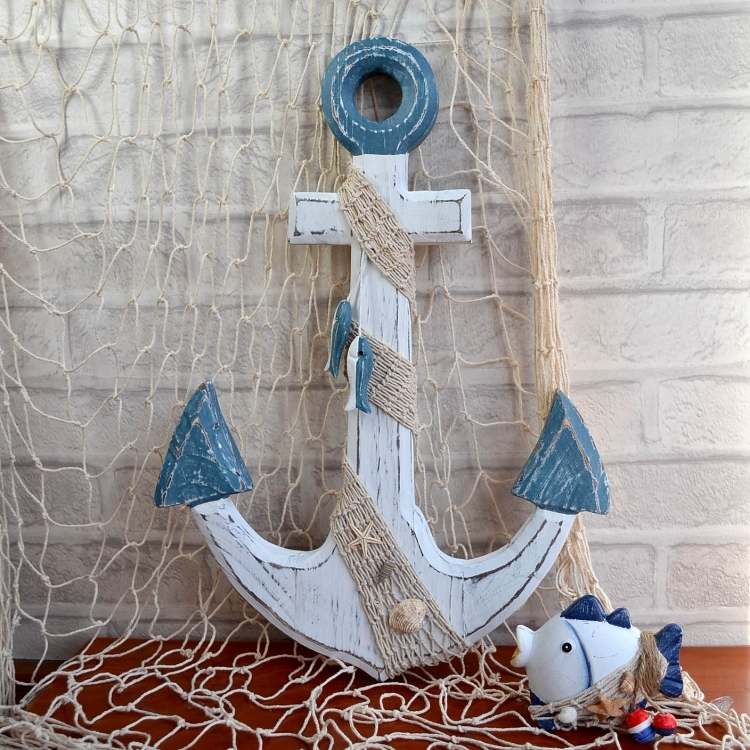 Fiskenät-dekoration-vägg-draperat-trä-ankare
