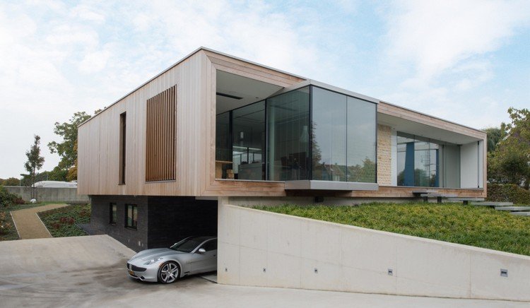 Platt tak hus design källare-garage-cantilever-kök-uteplats
