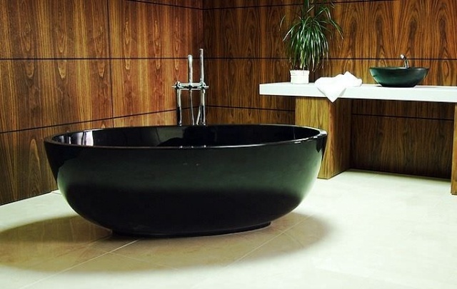 modernt badkar i konstgjord sten-svart oval-fristående petit-castello-design