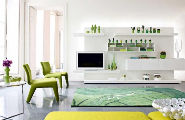 färger i vardagsrummet vitt grönt väggaggregat gräsgrön matta
