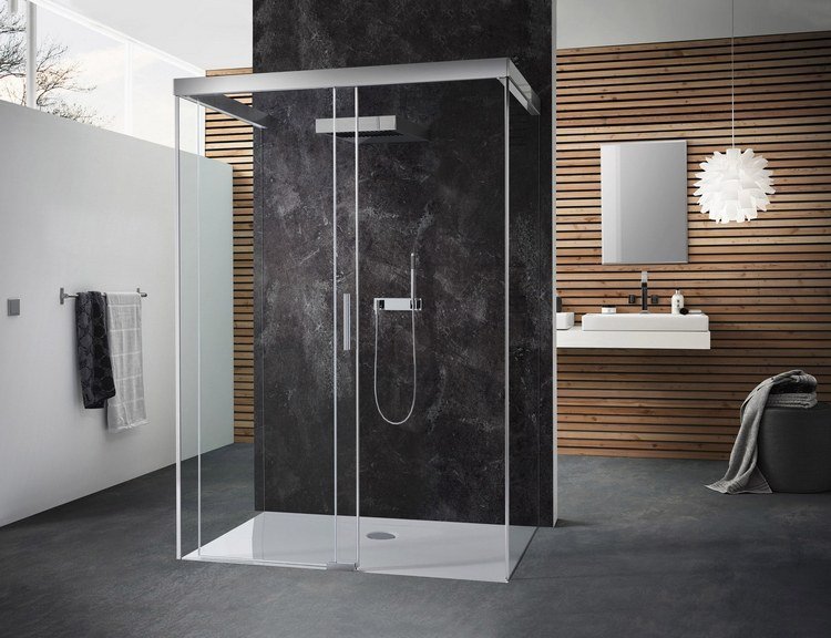 modern-badrum-design-med-trä-lameller-och-mörk-sten-i-dusch-skåp-och-golv-