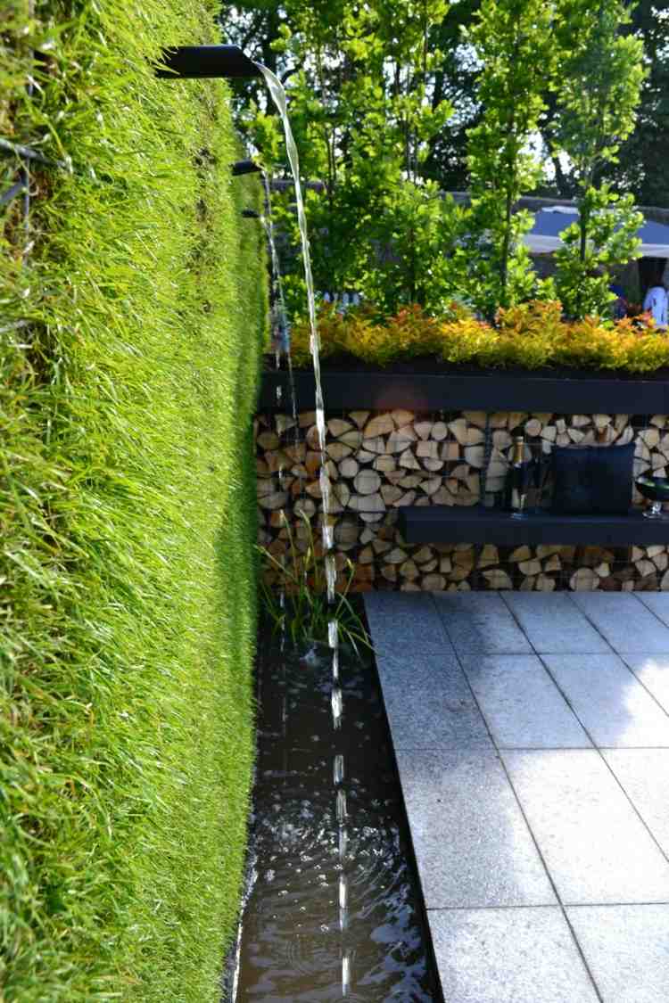 Stockar av trä gabion staket design vatten funktion bank terrass