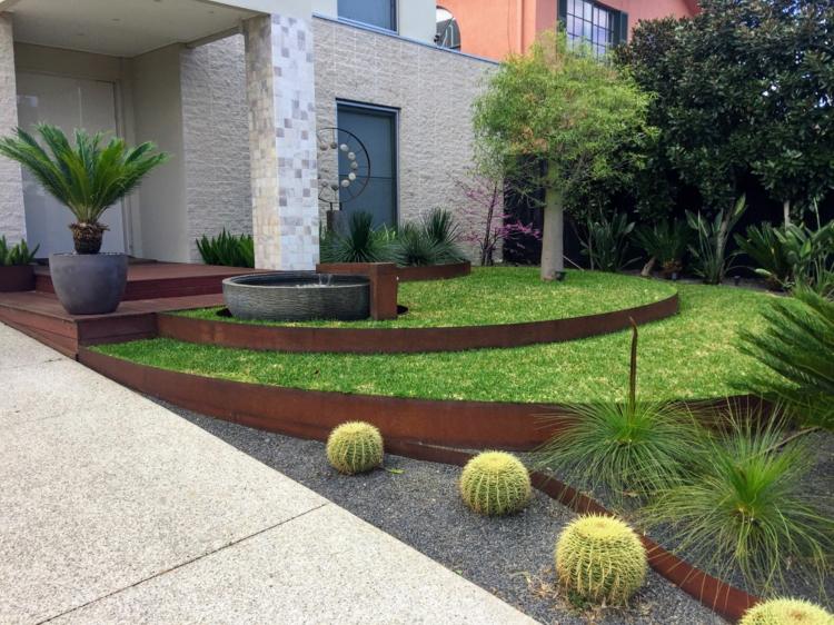 trädgård stödmur av stål bygga terrasser gräsmatta design