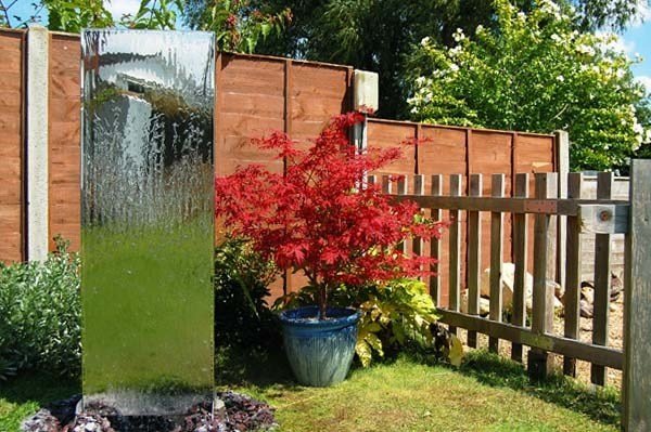 Rostfritt stål vatten vägg trädgård fontän design med vatten