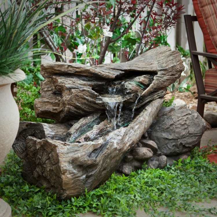 trädgård fontän bygga själv trädstam vatten funktioner