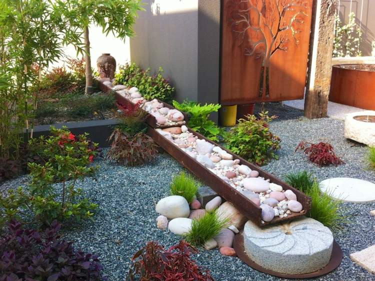 Trädgårdsdesign japansk trädgård grusgolv modernt staket
