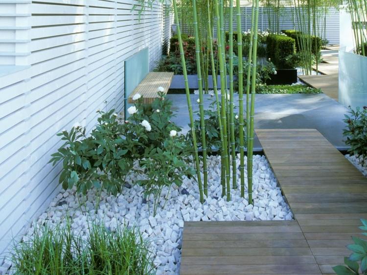 trädgårdsdesign-japansk-land-trädgård-stig-stenar-vit-bambu