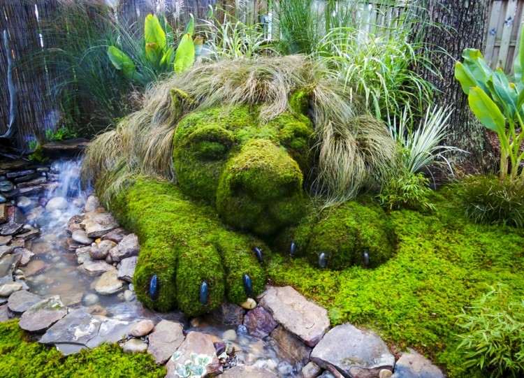 trädgård-design-med-stenar-bäck-mossa-panter-graeser