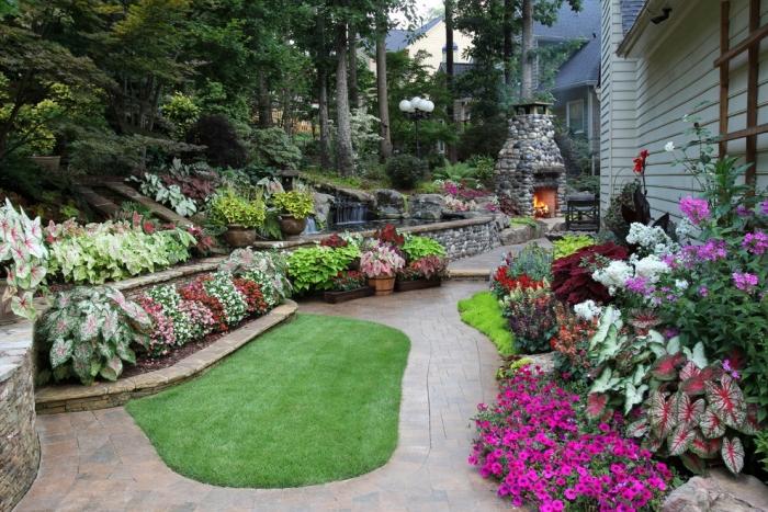 trädgård-design-rabatter-grönskande-trädgård-väg-stenläggning-stenar-gräsmattor
