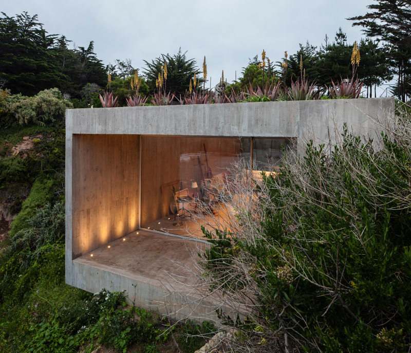 Trädgårdshus-vacker-utsikt-betong-glas fasad-hav