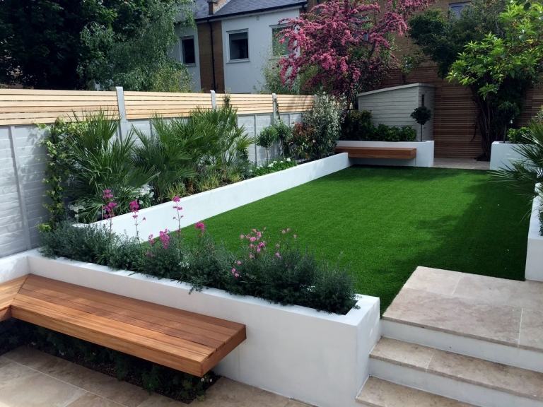 Trädgård och terrassidéer moderna upphöjda säng träbänk gräsmatta trädgårdstrender