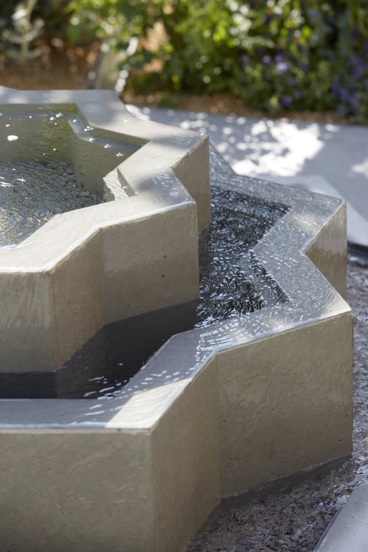 Vatten funktion fontän stjärna form betong tre nivåer