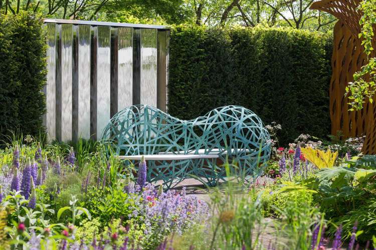 Modernt trädgårdsbänk design skulptur metallband