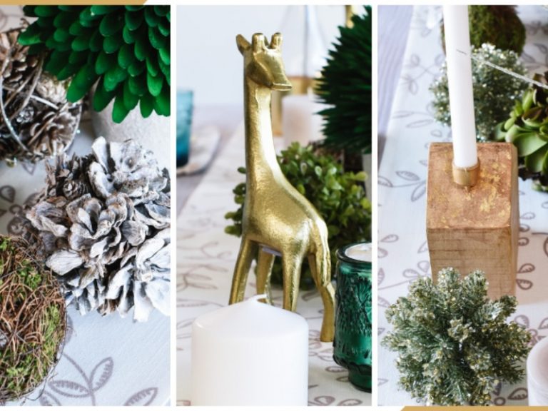 Däck till jul med kottar och mossbollar och gyllene dekorativa figurer