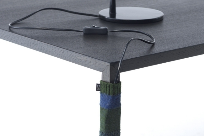 blågrön stickad strumpa för skrivbordsdesign