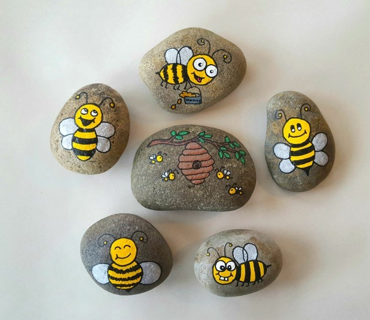 Dekorera trädgården med målade stenar - Roliga bin och bikupa