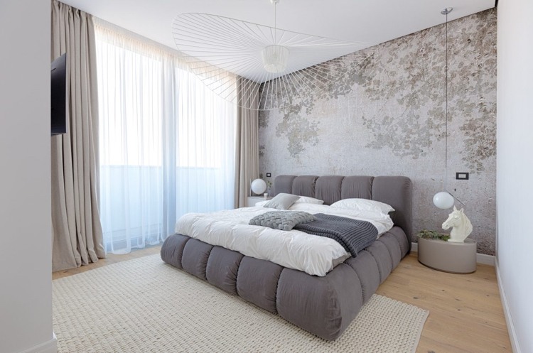 grå möbler sovrum stoppad säng betong vägg fototapet