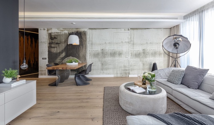 grå möbler vardagsrum trägolv hörn soffa spotlight modern