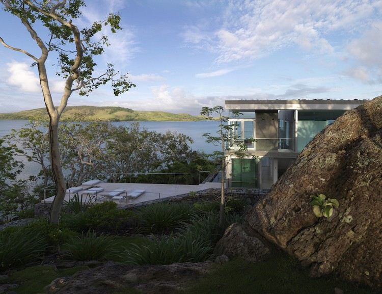 obegränsat-levande-koncept-hus-ö-vacker-utsikt-hav