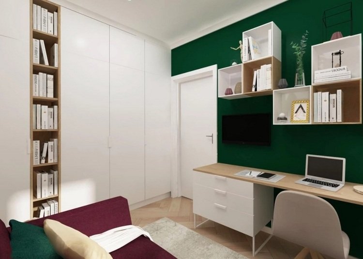 Inreda en arbetsplats med en soffa i vitt och mörkgrönt