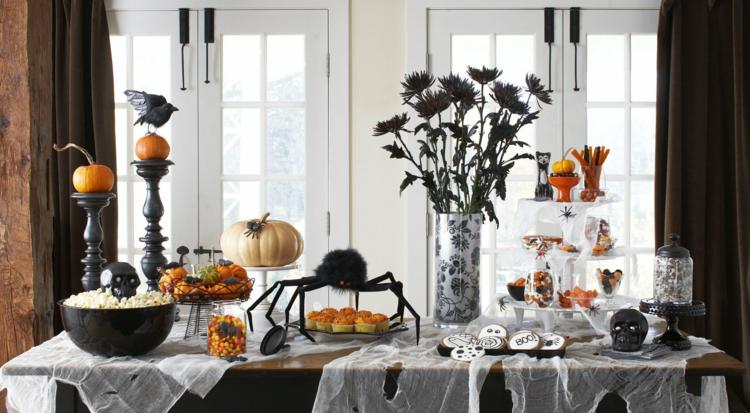 klassiska halloween bordsdekorationer i svart och orange
