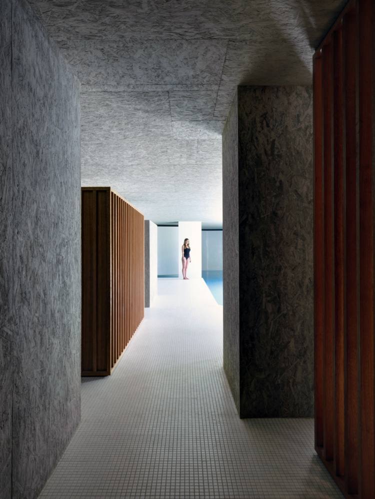 förlängning pool hus trä accenter mosaikgolv pool design grå
