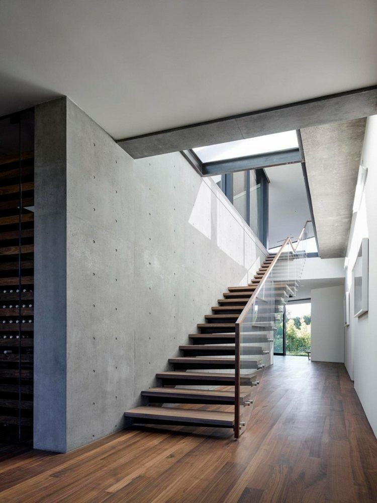 hus bostadsstruktur betongvägg byggnad glas räcke trappor hall