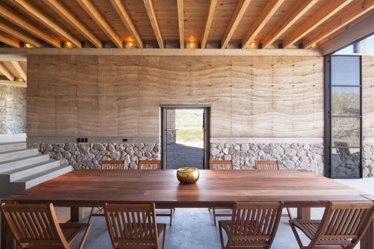 hus tillverkat av återvunnet material betongvägg effekt modern matplats belysning