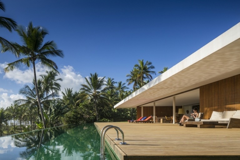 terrass design pool fönster vardagsrum palmer utsikt havet