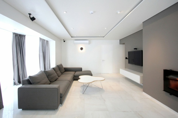 husinredning vardagsrum modern grå väggskänk