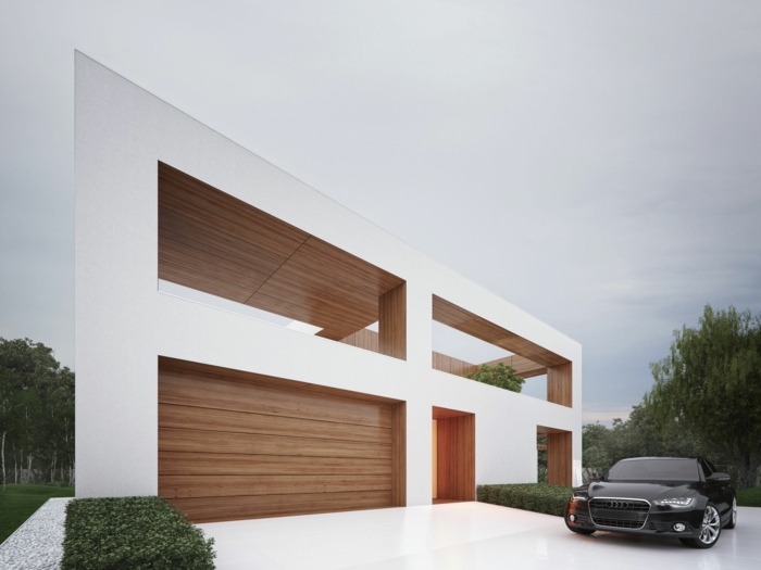 minimalistisk stil hus garage entré uppfart audi