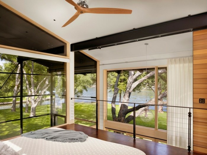sovrum övervåning hus design modern säng fläkt