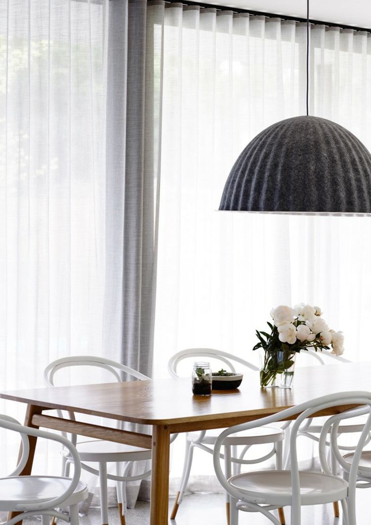 matsal bord stolar lampa interiör i betong utseende