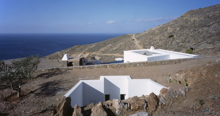 hus med vit och sten fasad ö cykladerna grekiska havet