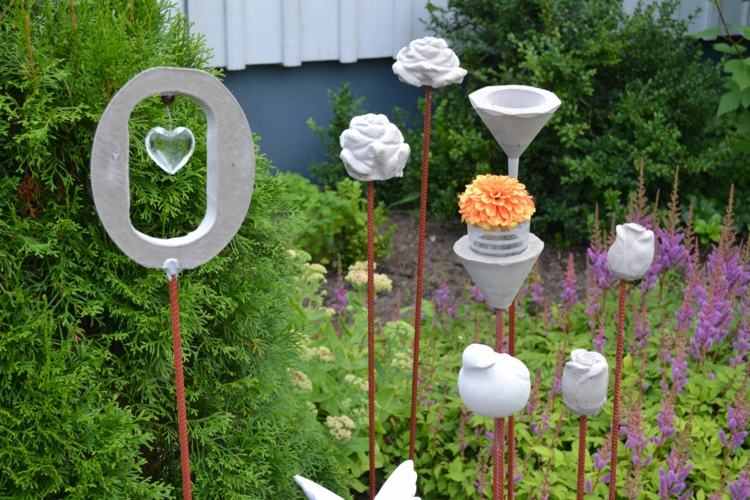 Gör trädgårdspinnar av betong själv - instruktioner för former och hantverksidéer