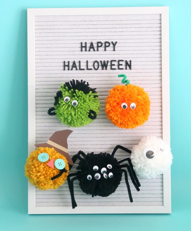 Halloween dekoration idé med pomponger hantverk med barn
