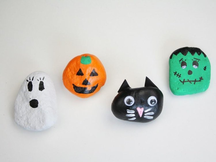 Hur man målar Halloween -dekorationer av stenar