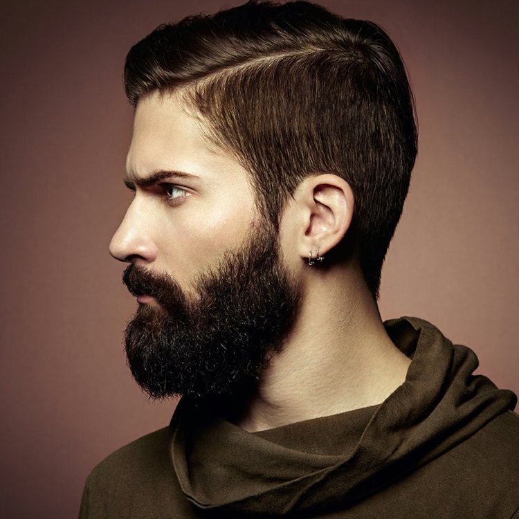 hipster-skägg-man-trend-helskägg-frisyr-kortsida avskiljningsörhängen