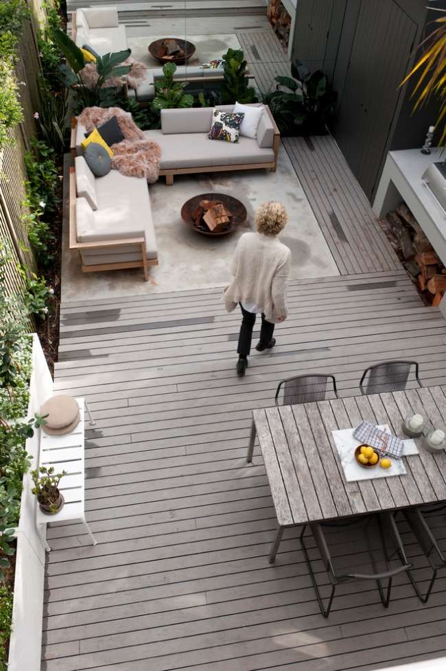 terrass design golvbräda grå patina sittgrupp öppen spis