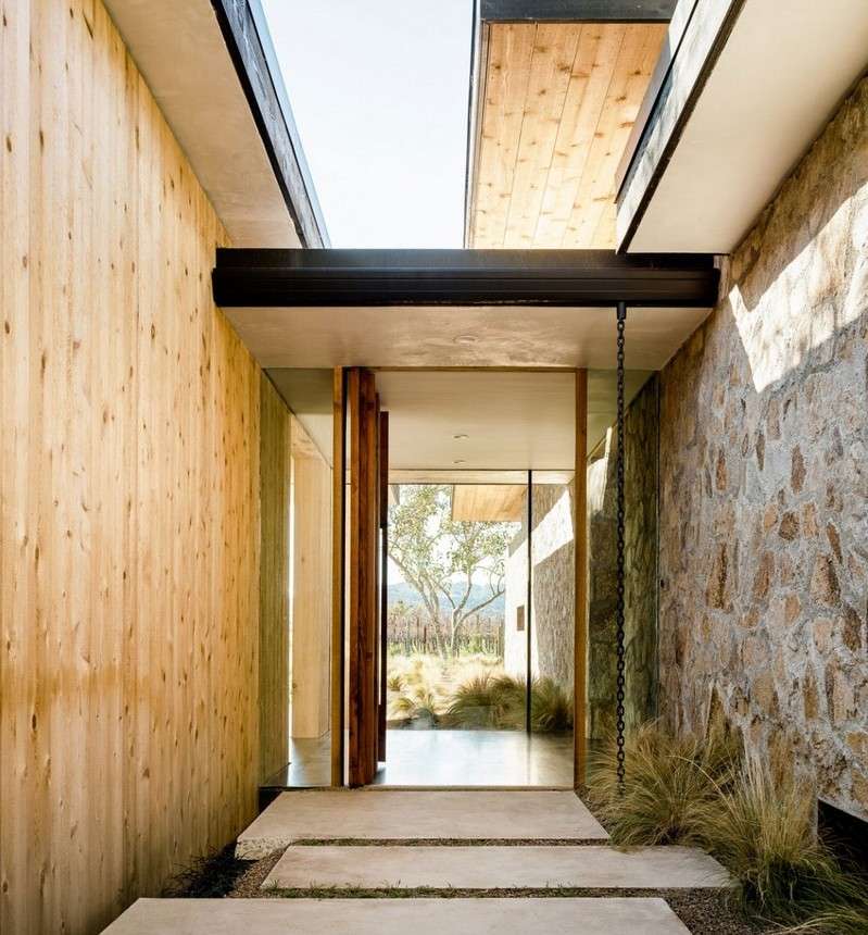 Trä-natursten-fasad-hus-entré-design